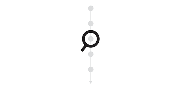 a magnifying glass imposed over a vertical dotted line