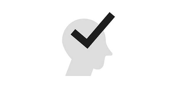 Silhouette of a head with a check mark