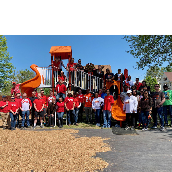 KeyBank employees renovating a playground in Glenville, Ohio for Neighbors Make a Difference Day