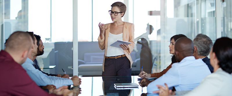 Woman giving a presentation during a meeting