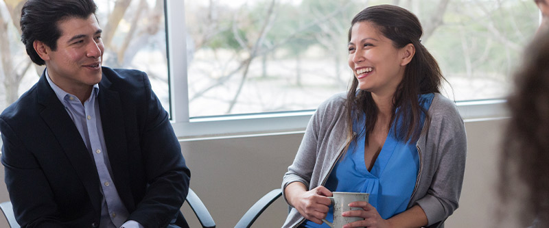 People sitting together and smiling