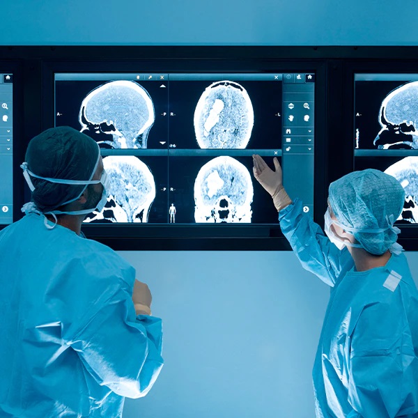 Doctors looking at x-ray image