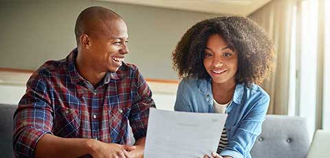 Man and woman going over papers together