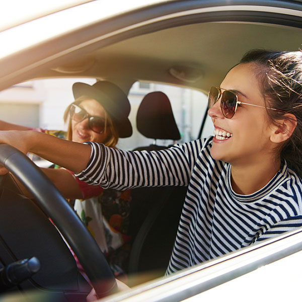 Women driving in car