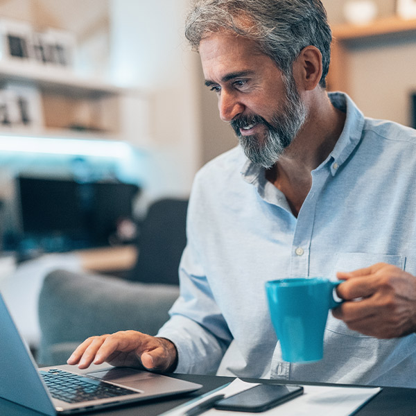 man drinking coffee