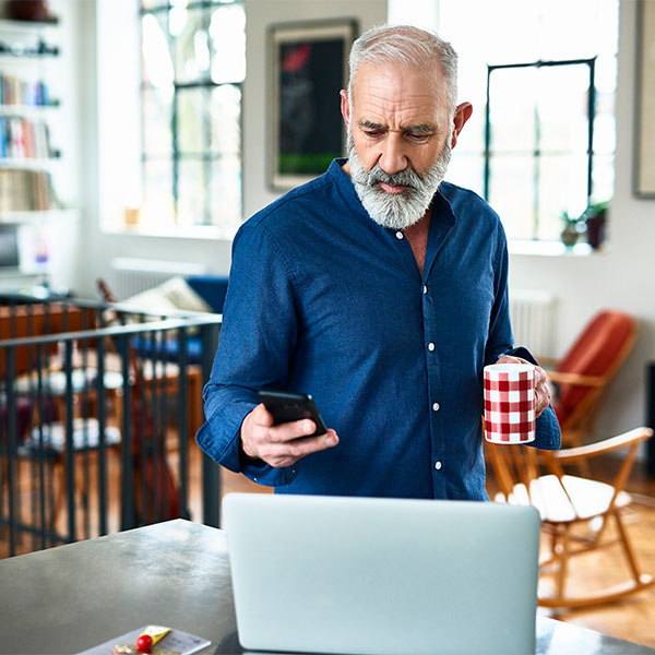 Man banking looking at phone