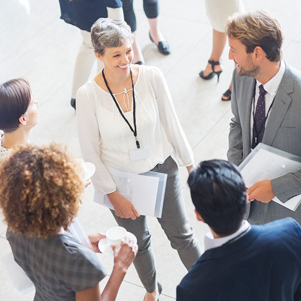 People standing at a conference