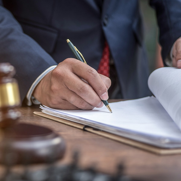 Man signing documents