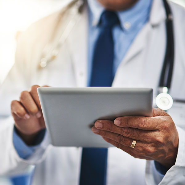 physician using a tablet